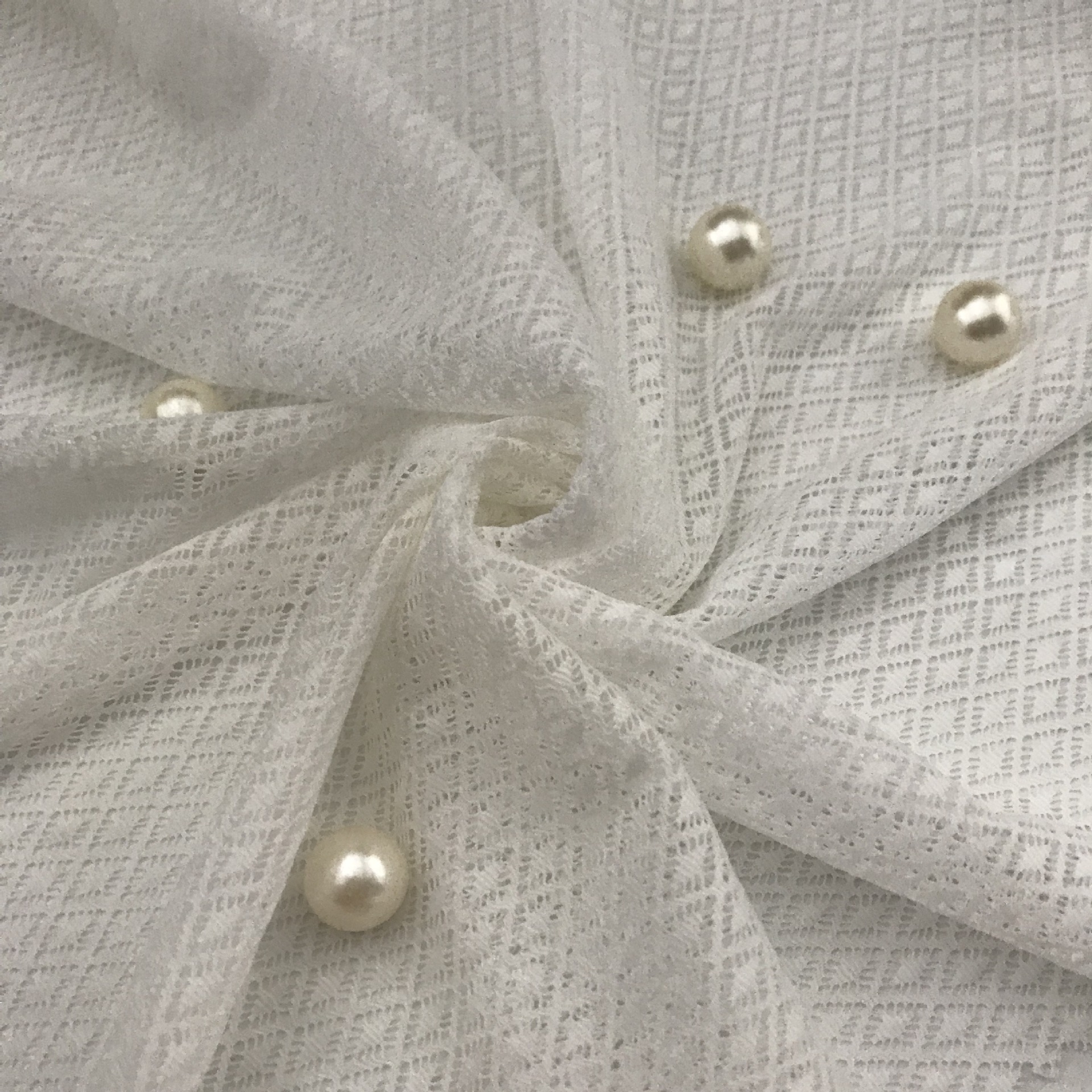 自主设计纤薄经编锦氨弹力菱形点网布提花面料110克