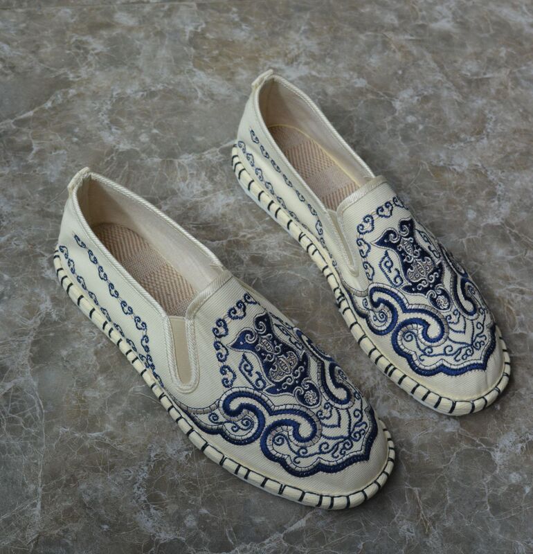 white embroidered shoes