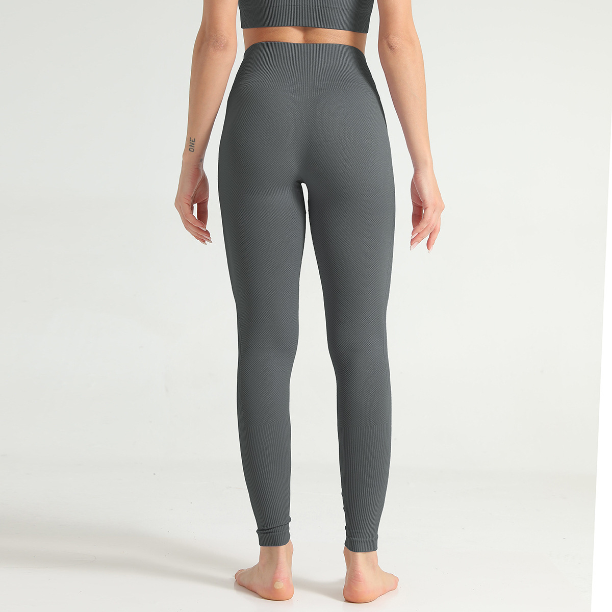 pantalones de yoga que absorben la humedad a rayas de color sólido sin costuras NSNS12222