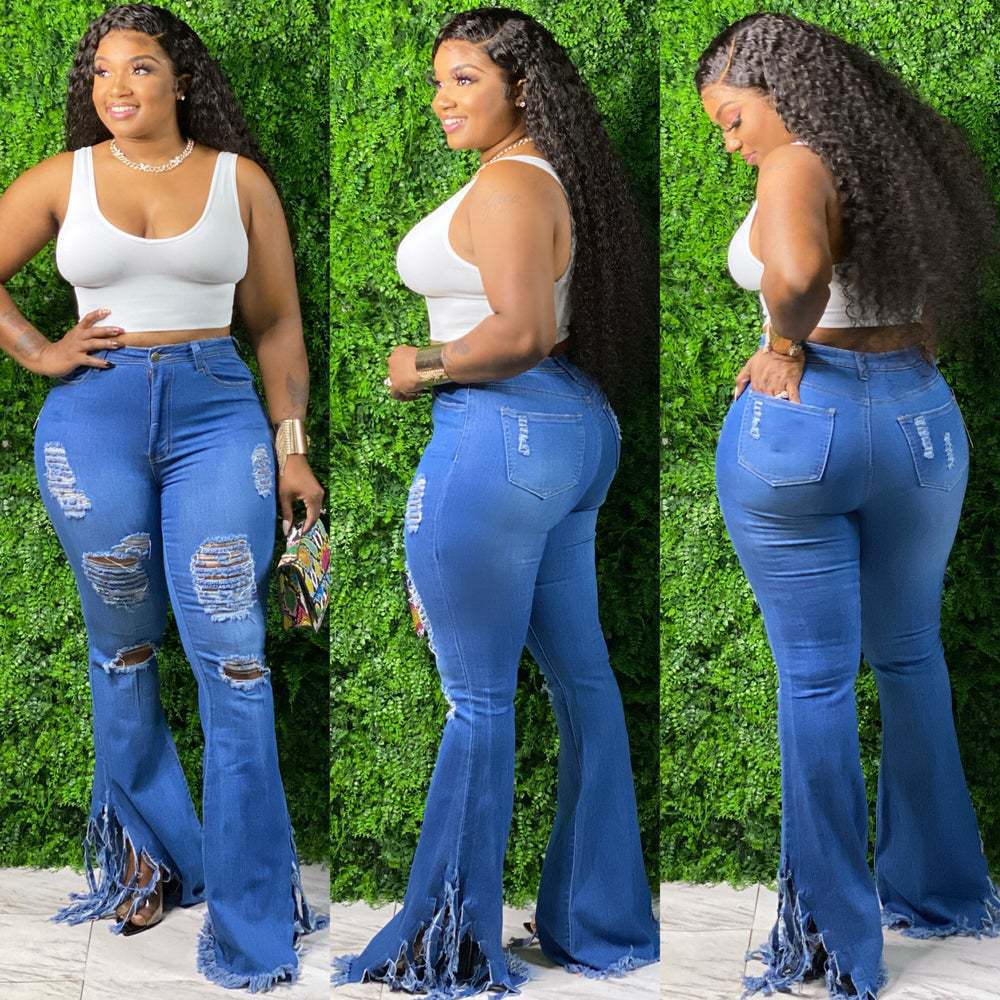 Dames high waist jeans met split en franjes in flare model_voghion.com