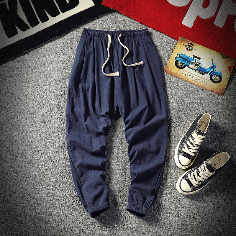 Pantalones cortos de los hombres recortados versátiles estilo coreano Pantalones deportivos de moda Pantalones de verano sueltos de los hombres pantalones atados al tobillo pantalones casuales pantalones de los hombres flacos