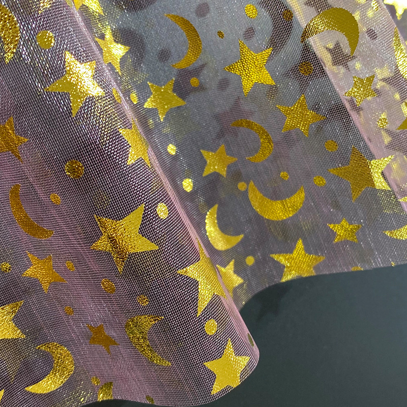 Fabricante suministro de ergena estrellas de la luna estampado tela de red de embalaje de boda bolsa tela de vestido