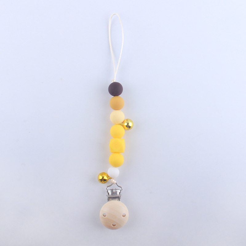 Pequeña campana bebé silicona pezón clip cadena dientes de bebé Cadena de molienda cadena anti-caída calmante teether pezón