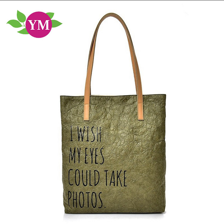 批发杜邦纸袋印logo图案牛皮纸袋手提包单肩撕不烂防水洗纸袋厂家