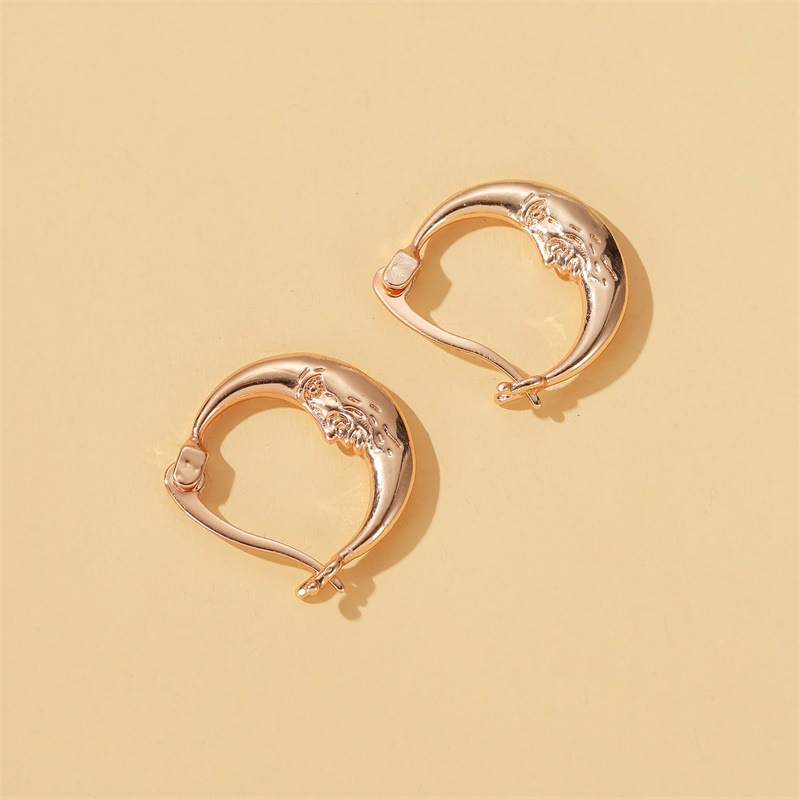 New Earrings Personality Moon Earrings Ear Buckle Fashion Gold Abstract Short Paragraph Face Earrings Wholesale Nihaojewelry display picture 4