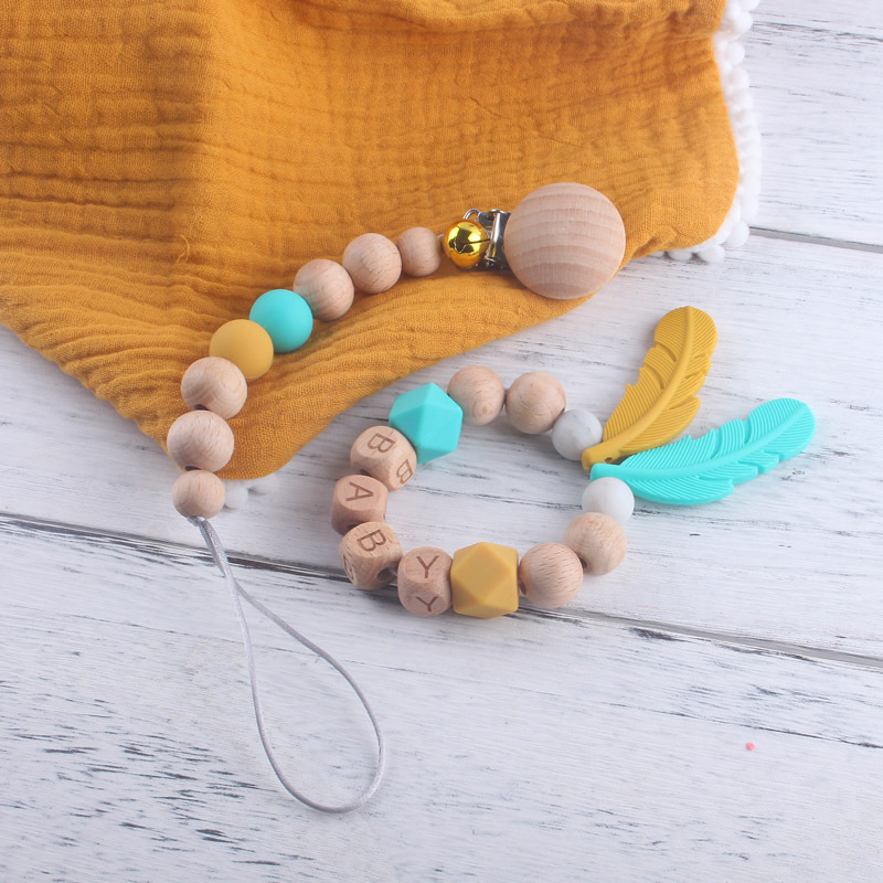 Baby Beech Cadena de chupete de silicona Cadena de molienda de dientes de bebé calmante cadena anti-caída cadena anti-perdida con Bell