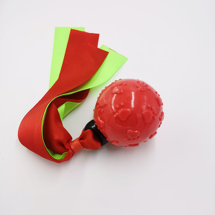 Nuevo suministro directo de fábrica Amazon mascota perro sonido juguete interactivo mordedura-resistente TPR cinta Bola de juguete al por mayor