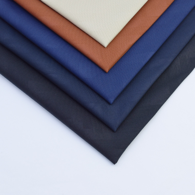 现货棉涤混纺纱卡面料双股弹性印花薄料弹力休闲裤男裤斜纹面料