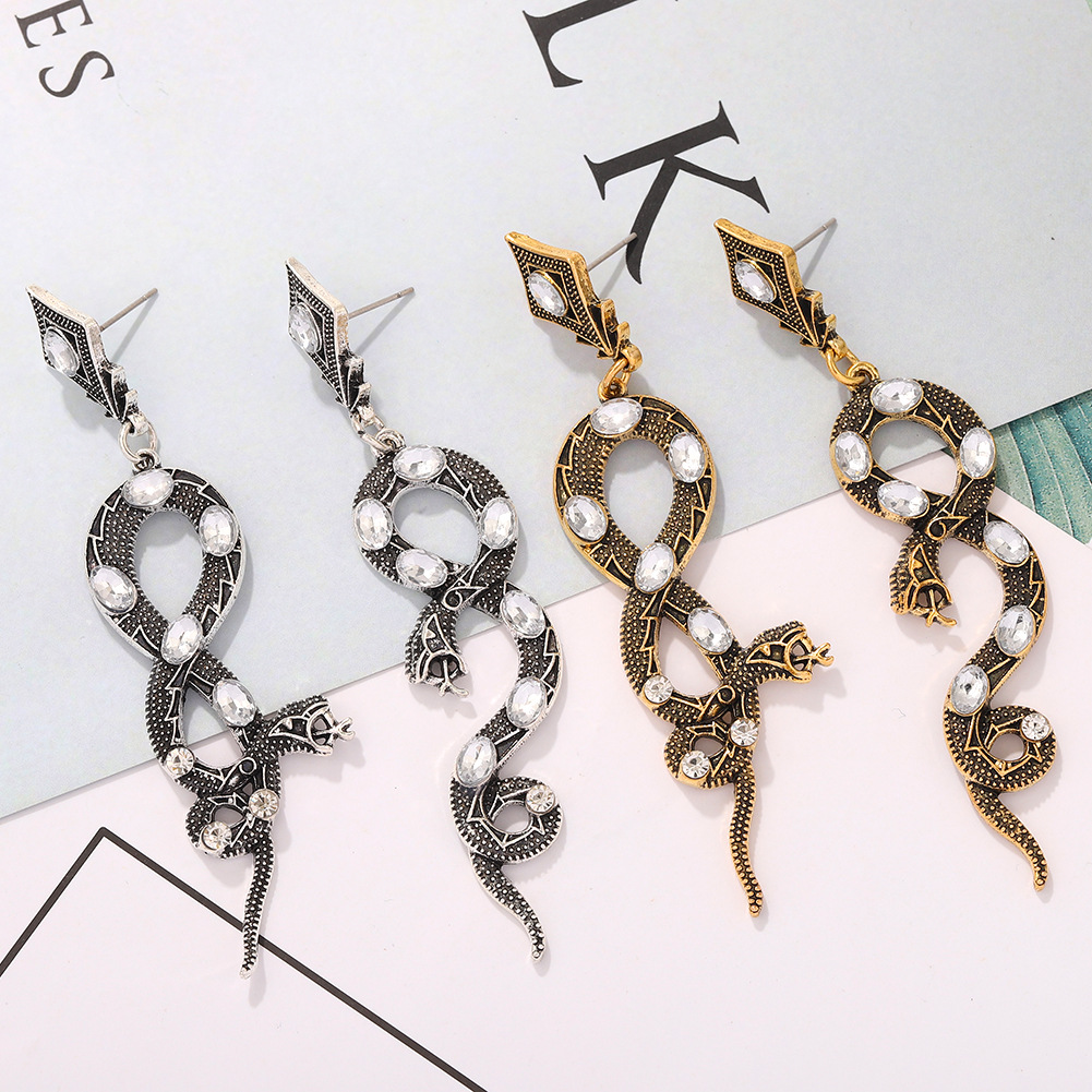 Hot Selling Exaggerated Snake Inlaid Pearl Python Earrings display picture 5