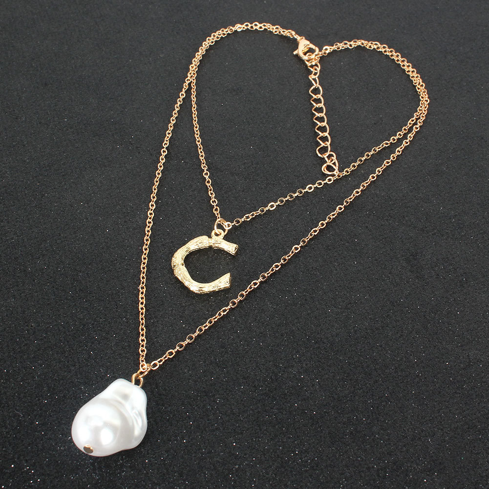 Europe And America Cross Border Necklace Personality Alloy Letter C Shaped Pearl Pendant Necklace Female 15080 display picture 5