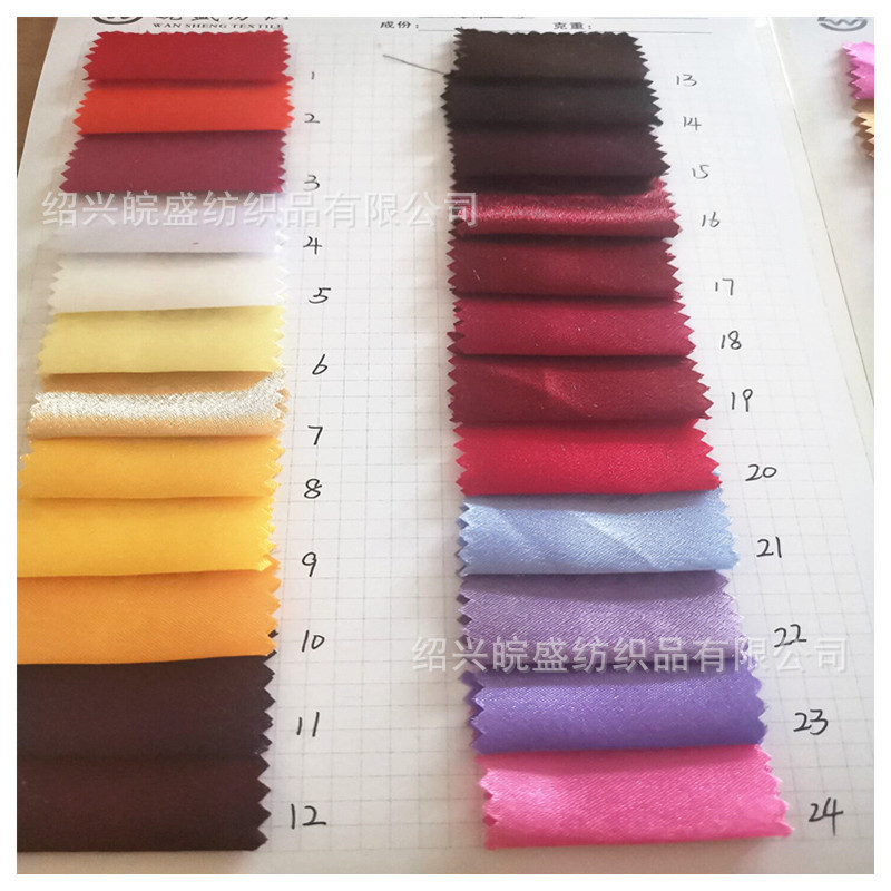 涤纶加捻色丁 仿真丝缎面有光无弹麻丁包装工艺品舞台服装面料