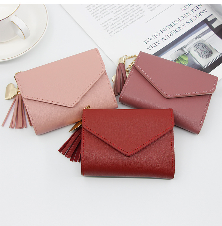 Women's Solid Color Pu Leather Tassel Flip Cover Coin Purses display picture 1