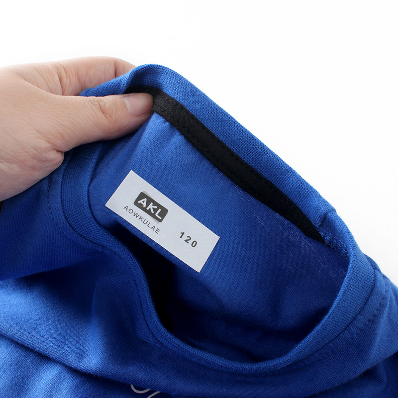 Primavera y otoño estilo coreano ropa para niños nueva camiseta de manga larga para niños medio y grande color de algodón para niños a juego camisa de fondo para niños de dos piezas falsas