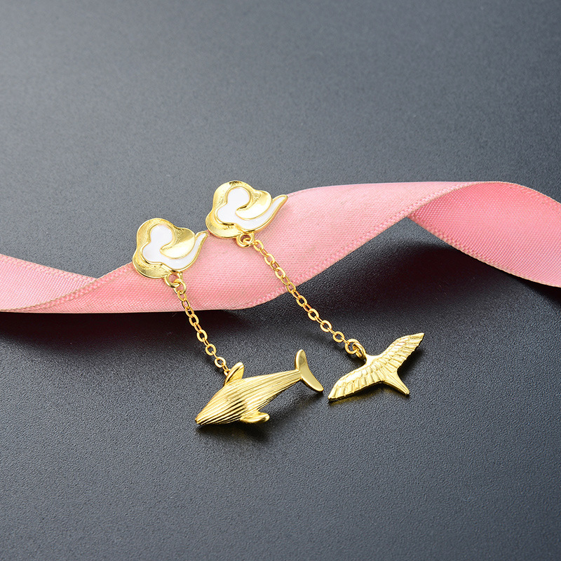 S925 gota de plata aceite ballena larga oreja pendientes estilo japonés y coreano creativo oro asimétrico pájaro pendientes