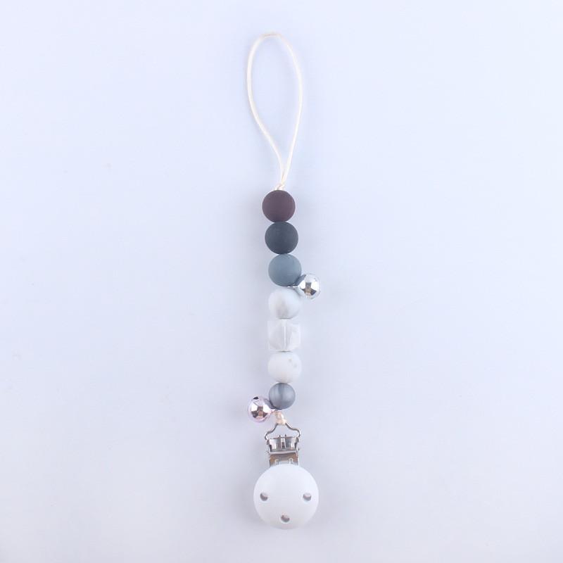 Pequeña campana bebé silicona pezón clip cadena dientes de bebé Cadena de molienda cadena anti-caída calmante teether pezón