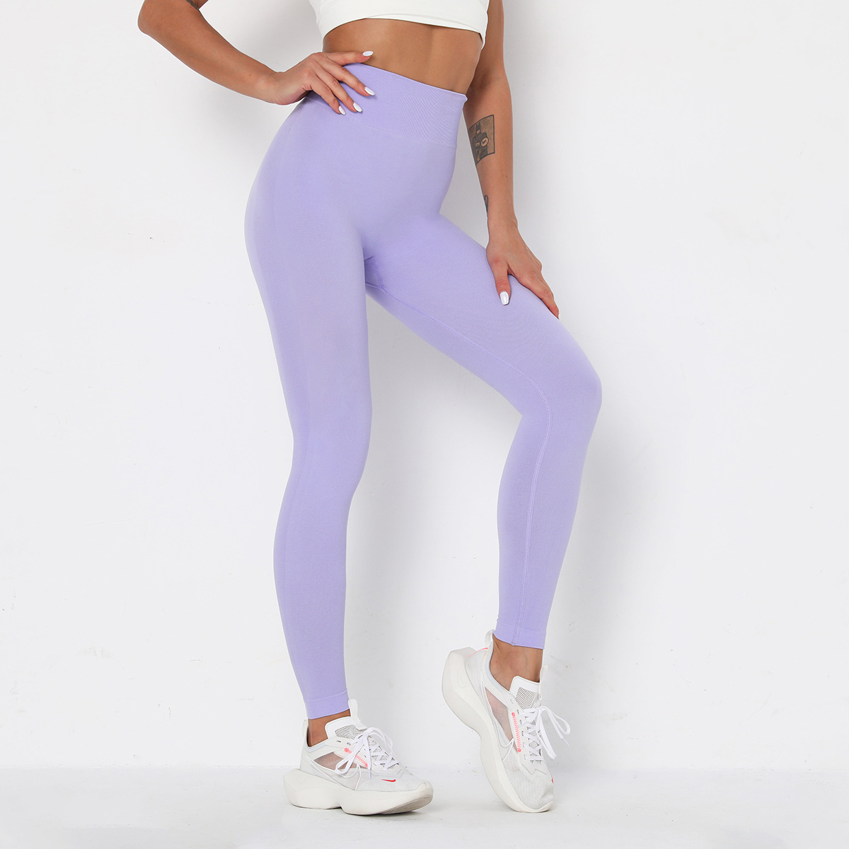 Pantalones de fitness ajustados de cintura alta de punto sin costuras NSLX9024