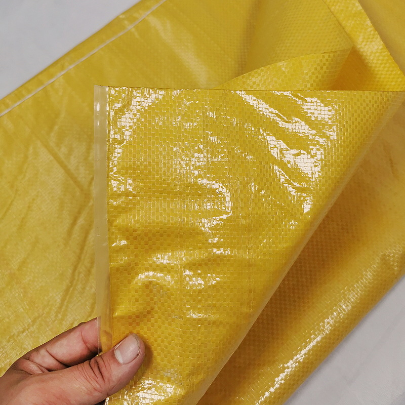 亮黄色覆膜编织袋搬家袋子服装打包袋蛇皮袋子加厚防水超大号麻袋