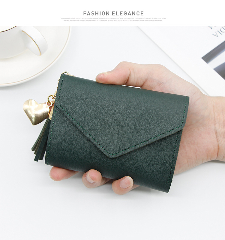 Women's Solid Color Pu Leather Tassel Flip Cover Coin Purses display picture 4