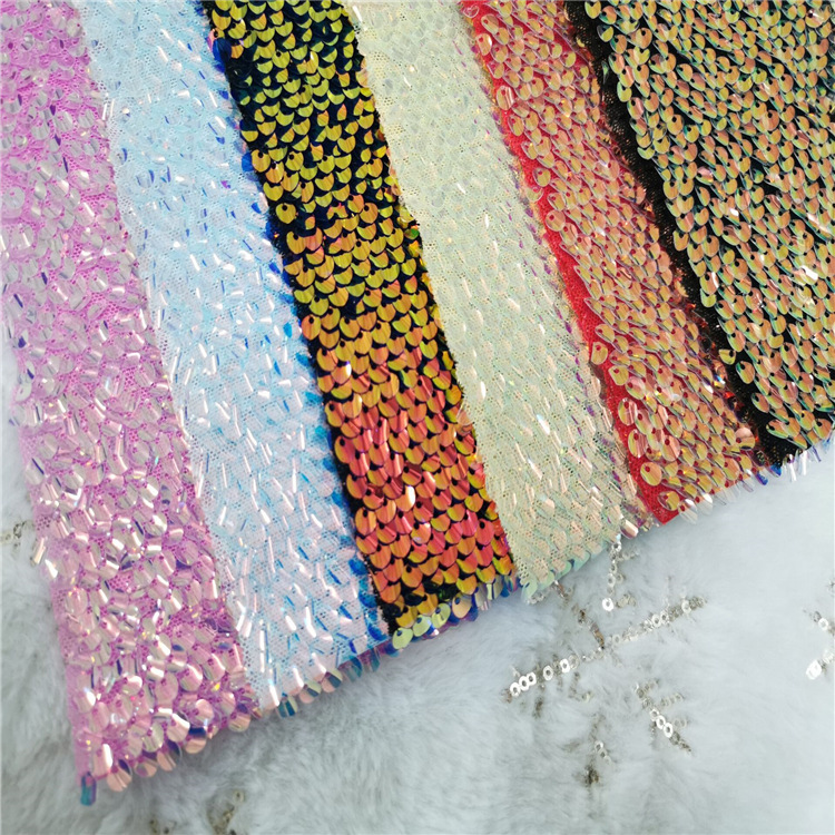 新款现货供应锦纶网金光瓦片亮片面料服装装饰布料
