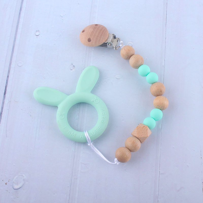 Nueva fábrica directa bebé Beech juguete mordedor bebé chupete de silicona pezón anti-gota cadena materna y infantil suministros