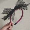 With bow, black