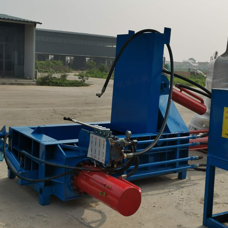 金属压块机的工作原理