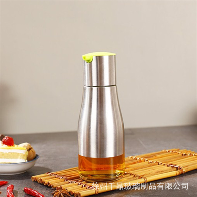 Venta al por mayor engrasador de vidrio controlable salsa de soja botella de vinagre botella de condimento de olla suministros de cocina botella de aceite de acero inoxidable logotipo impreso