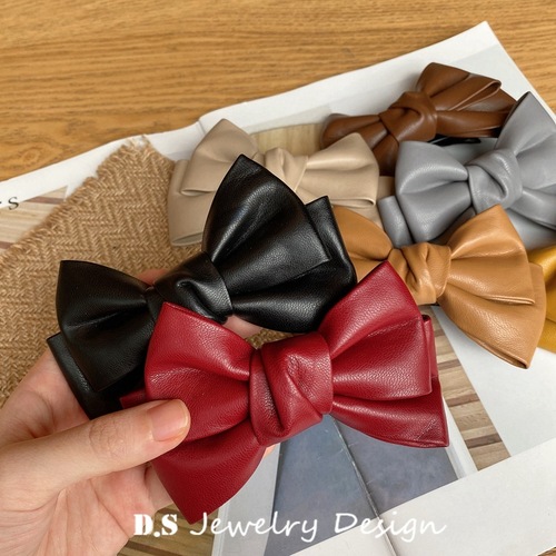 South Korea's Dongdaemun temperament retro spring and summer new PU leather bow hairpin Internet celebrity pressure clip bangs clip hair accessories