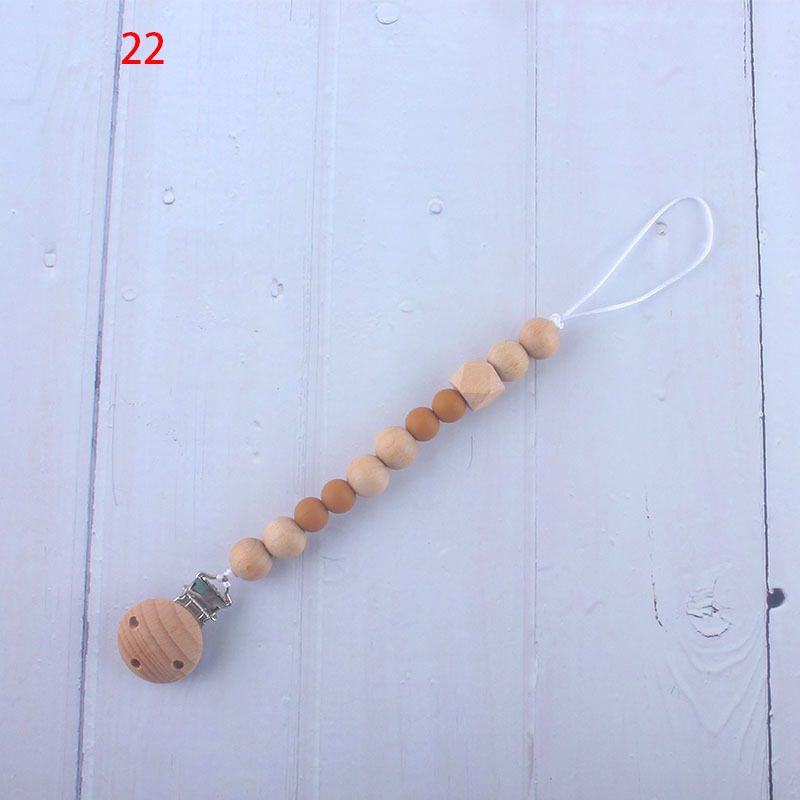 Nueva fábrica directa bebé Beech juguete mordedor bebé chupete de silicona pezón anti-gota cadena materna y infantil suministros