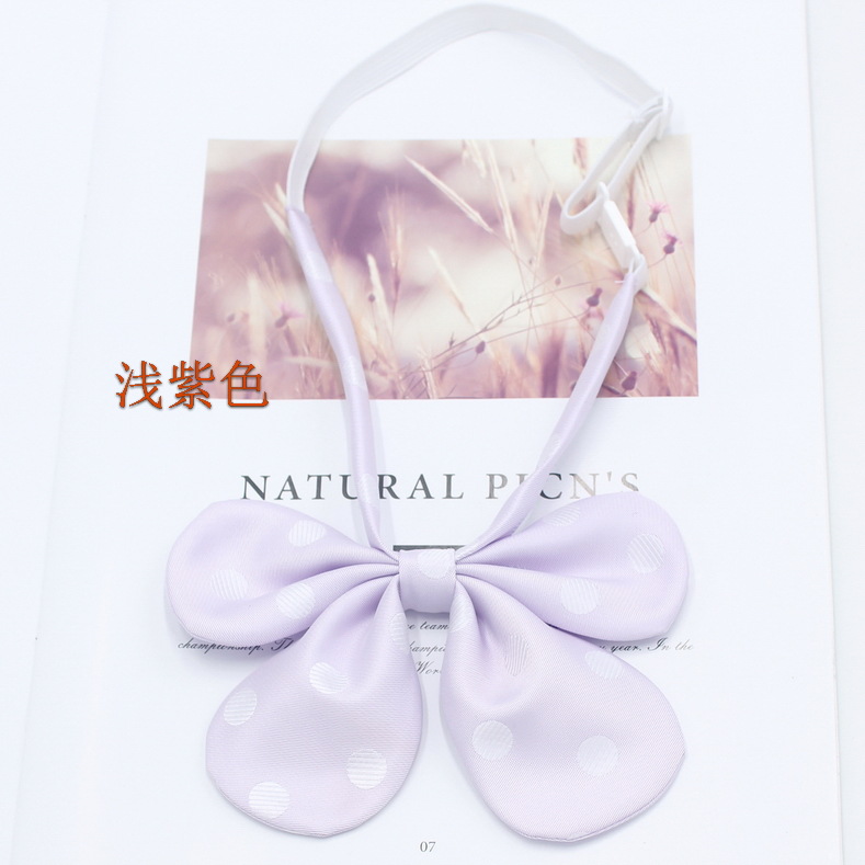 Pluma curvada raíz conejo oreja collar flor pajarita femenina estilo coreano lunares lindo arco JK uniforme pajarita fabricante en stock