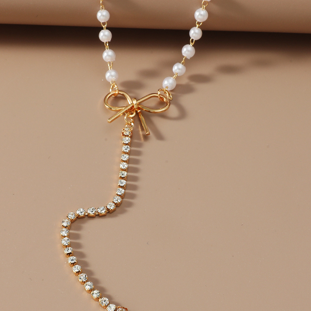 Long Bow Pearl Necklace display picture 6