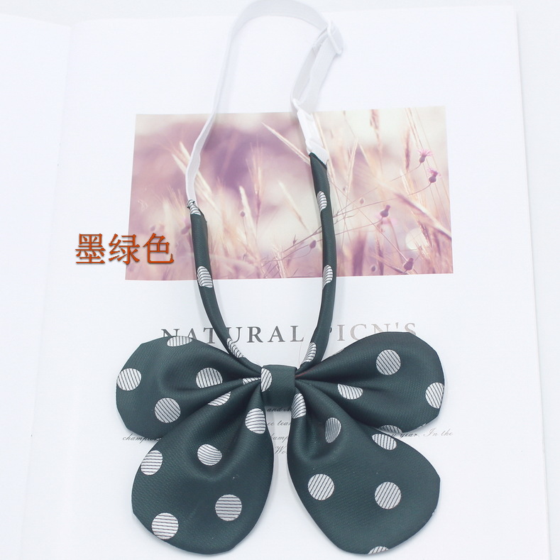 Pluma curvada raíz conejo oreja collar flor pajarita femenina estilo coreano lunares lindo arco JK uniforme pajarita fabricante en stock