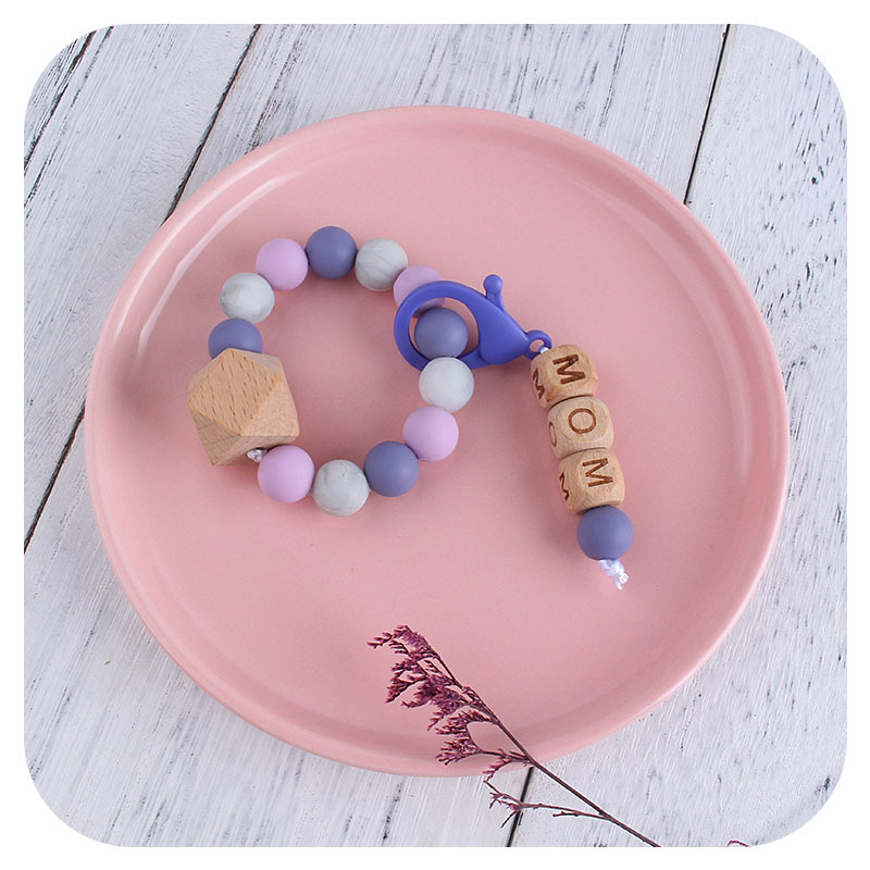 Nueva DIY creativo mamá langosta hebilla colgante de haya octogonal pulsera mordedor traje infantil silicona teether palo