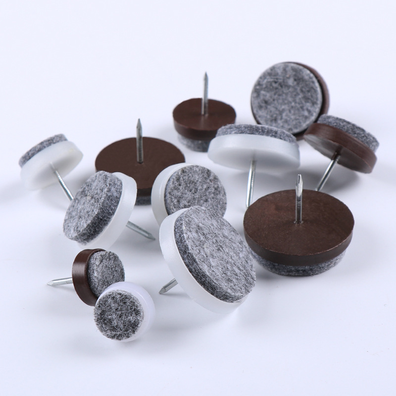 Suministro de fábrica de plástico fieltro piso uñas muebles mesa y silla Gabinete a prueba de humedad piso a prueba de arañazos pie almohadilla sofá pie clavo