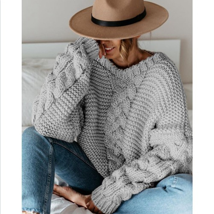 Suministro de comercio exterior deseo europeo y americano Otoño e Invierno popular color sólido suéter con cuello en V giro suéter suelto suéter casual para las mujeres