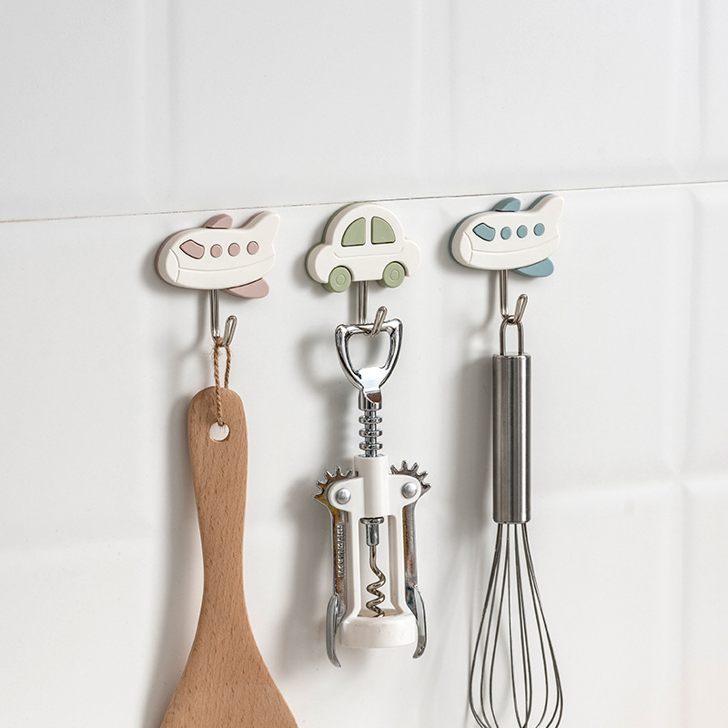 Tienda de departamentos al por mayor ropa creativa gancho de plástico nórdico simple gancho pegajoso fuerte detrás de la puerta cocina 972 gancho pegajoso