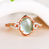 Factory direct selling four -claw hibiscus stone powder crystal ring female forest, grape emerald living mouth diamond ring to send a generation