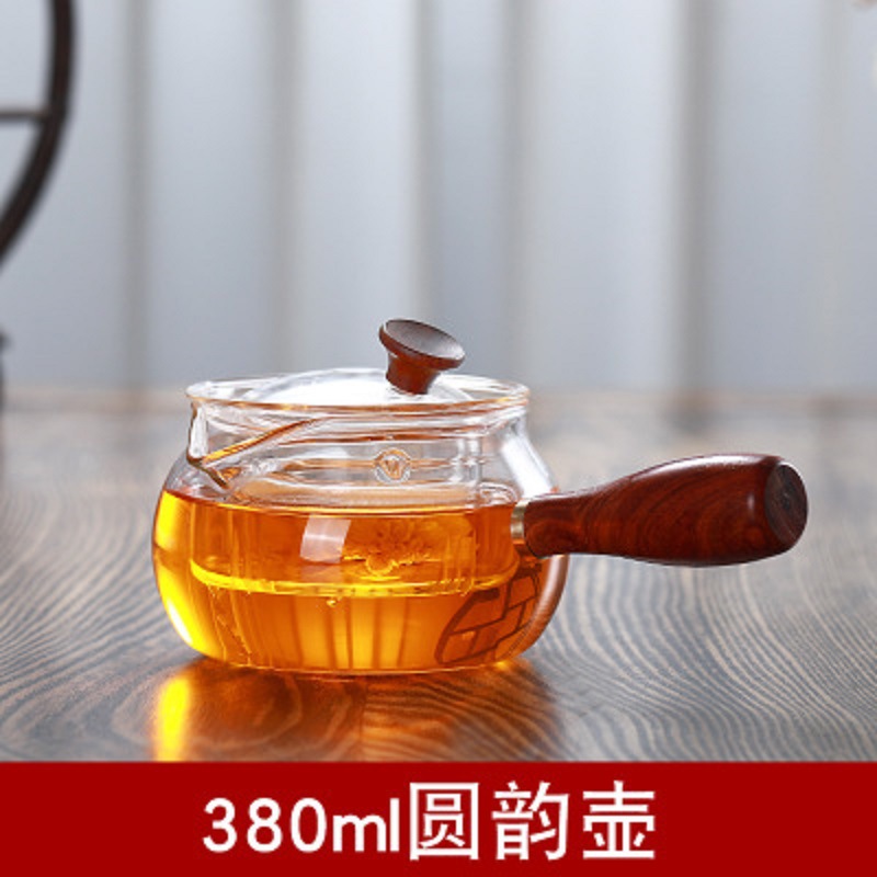 Fábrica al por mayor patrón de martillo mango lateral olla de vidrio resistente al calor tetera de La Flor eléctrica estufa de cerámica calefacción Kung Fu juego de té tetera