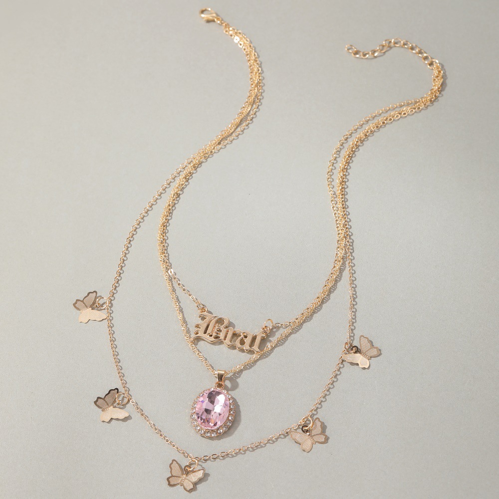 Nouveau Long Collier Créatif Petit Papillon Croix Lettre Pendentif Chaîne De Pull Multicouche En Gros Nihaojewelry display picture 6