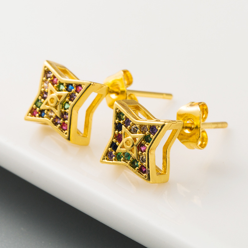 Fashion Small And Exquisite Four-pointed Star Hollow Earrings Copper Micro-set Color Zircon Earrings Ladies Niche Earrings  Wholesale Nihaojewelry display picture 3