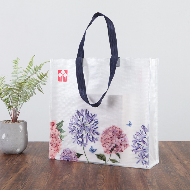 塑料PP覆膜编织袋定 做手提购物袋礼品袋定 制防水编织彩印立体袋