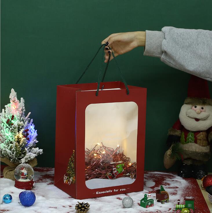 En stock Bolsa de regalo de Navidad bolso de la ventana Nochebuena Apple embalaje caja de cartón regalo de mano caja de dulces bolsa de regalo