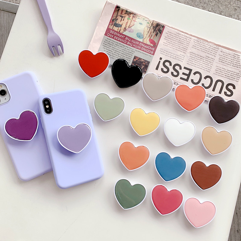 Airbag bracket creative gifts new solid color drop glue love retractable Mobile phone bracket small gift logo