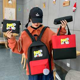 买一送四卡通可爱女生帆布潮背包初中学生书包补习袋小学生双肩包