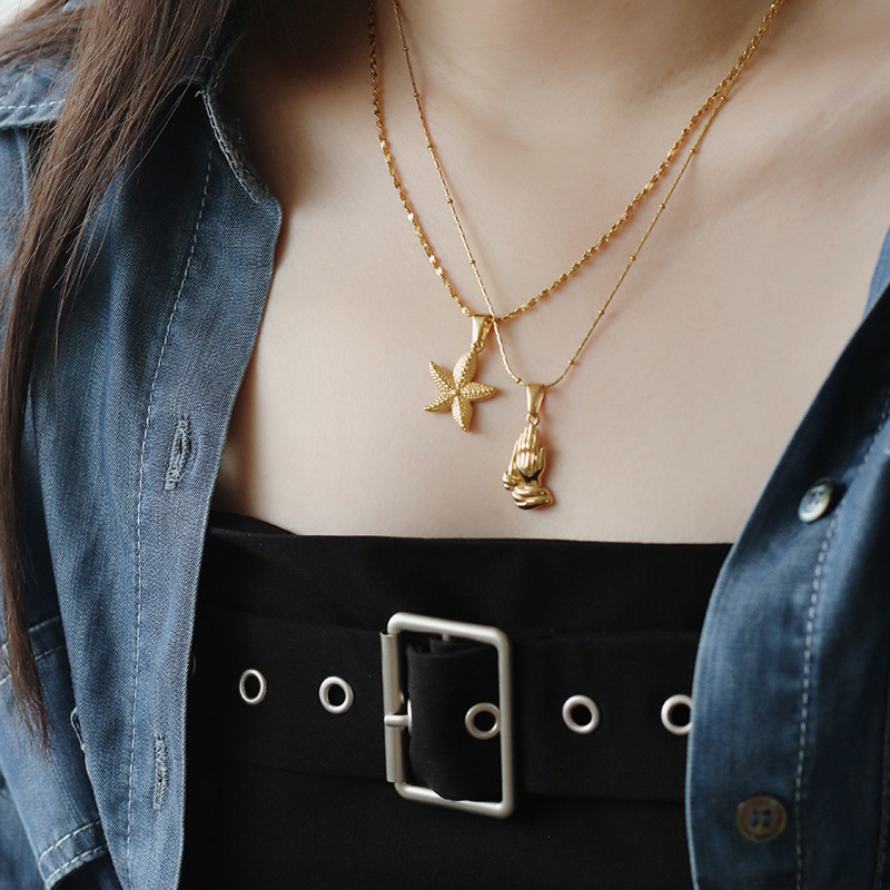 Stereo Eight Pointed Star Angel Libra Titanium Gold-plated Pendant Wholesale Nihaojewelry