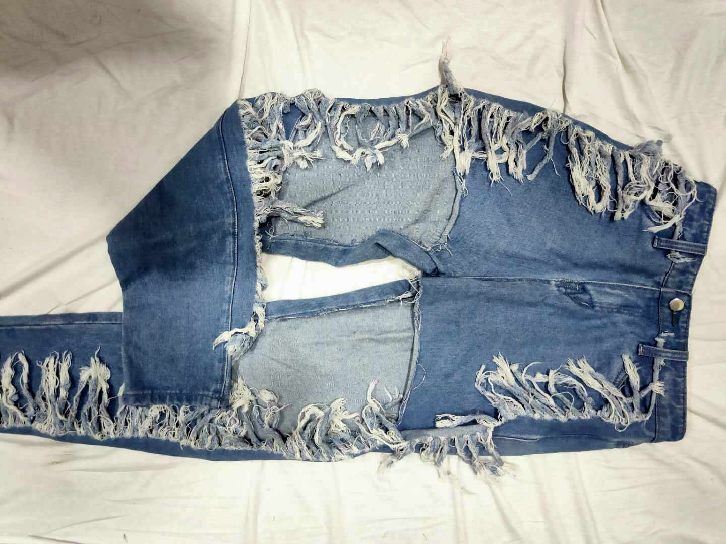 jeans rotos con flecos para mujer nihaostyles ropa al por mayor NSMFF79837