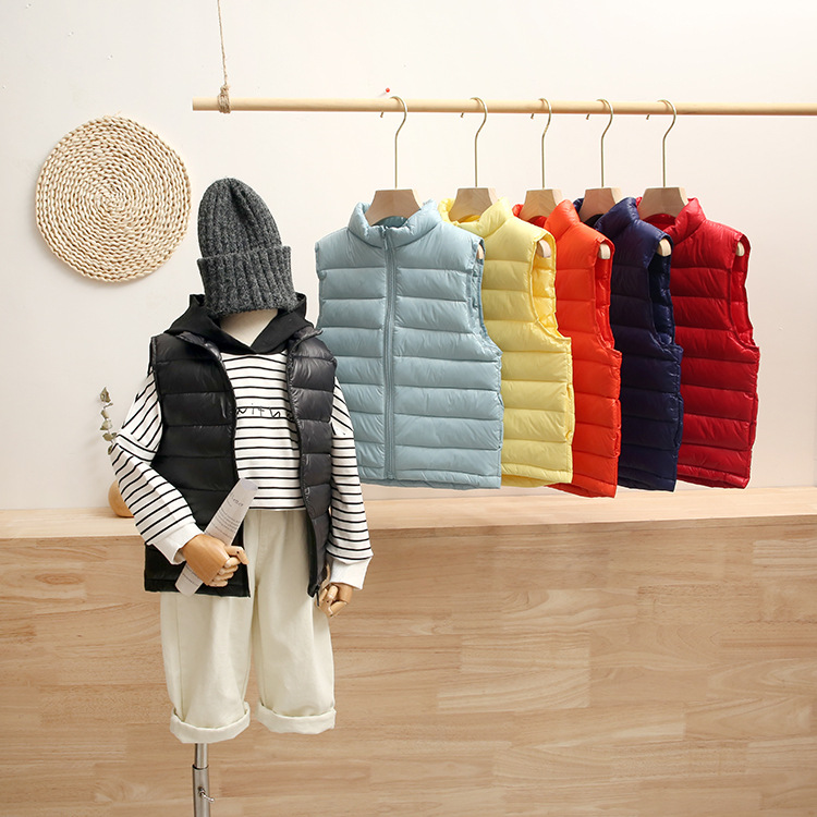 2020 Otoño e Invierno nuevos niños y niñas medianos y grandes niños bebé ligero soporte collar abajo chaleco entrega al por mayor