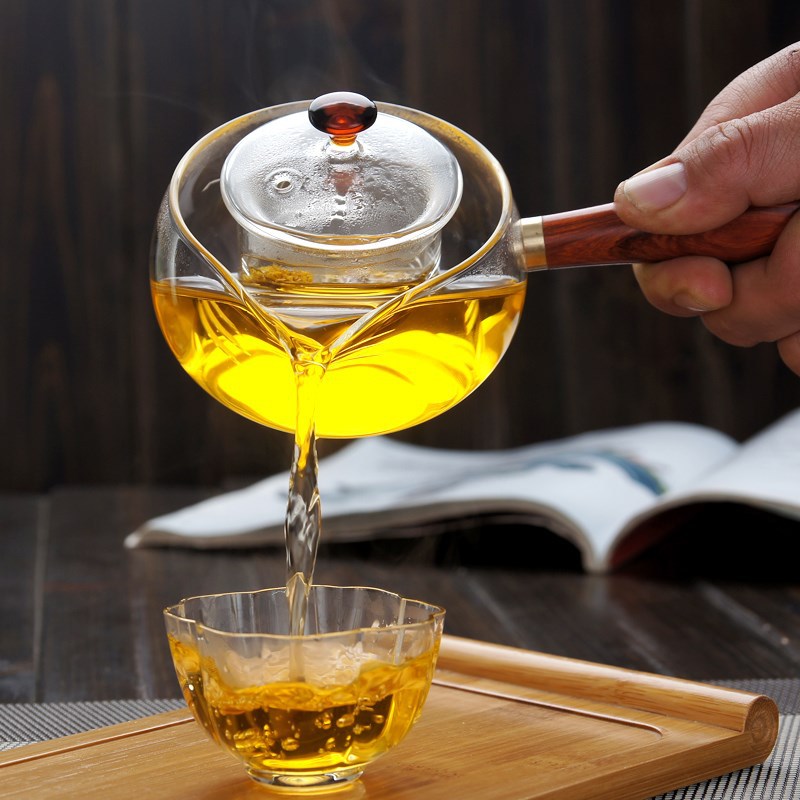 Fabricante de vidrio de borosilicato tetera pequeña verde naranja tetera eléctrica estufa de cerámica calefacción Kung Fu juego de té mango lateral tetera