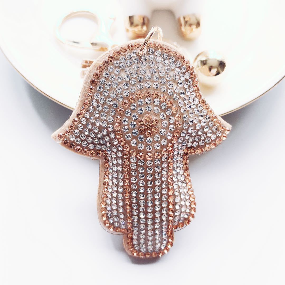 Venta caliente transfronteriza de Palma llavero coreano terciopelo rhinestone gato ojo llavero bolsa colgante accesorios en stock