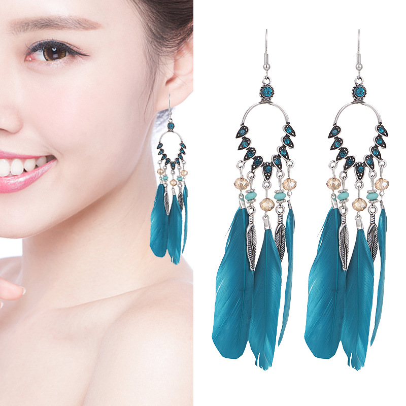 New Peacock Feather Diamond-studded Rice Bead Long Tassel Earrings display picture 1